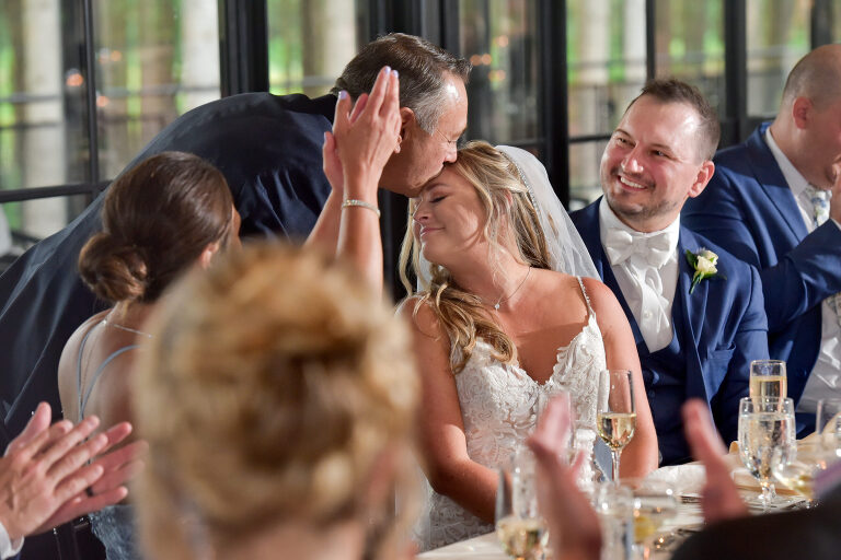 The father of the bride gives a sweet and sentimental speech inducing tears all around during his father of the bride speech at a wedding at Shepherd's Hollows Golf Club Clarkston, Michigan.