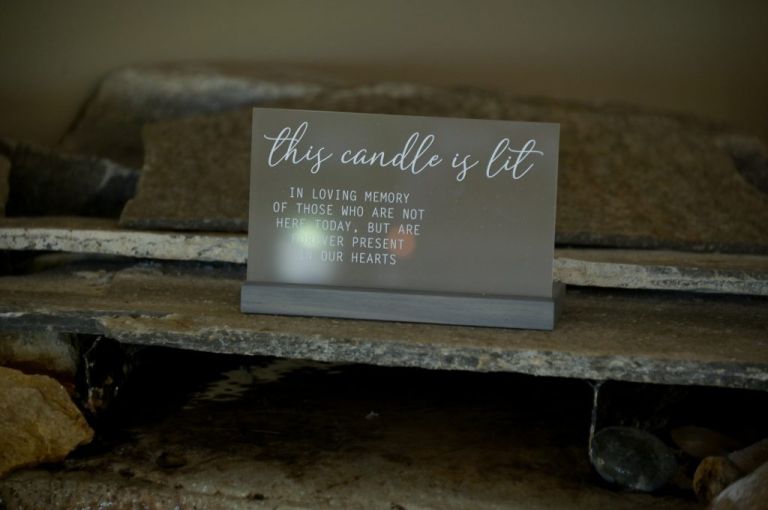 A bride and groom set up a display for their missing loved ones at the Fenton Brewery and Winery in Fenton, Michigan.