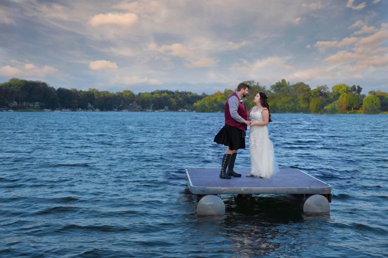 A bride and groom get some real alone time out on Long Lake in Brighton, Michigan.