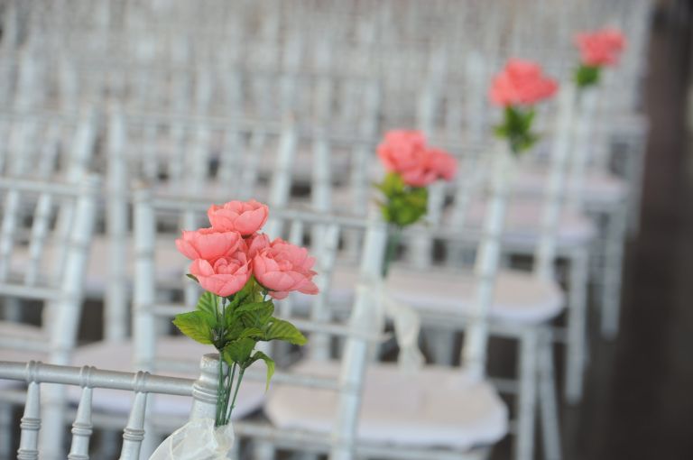 This wedding venue doesn't need much decoration since the wall of windows is plenty amazing.