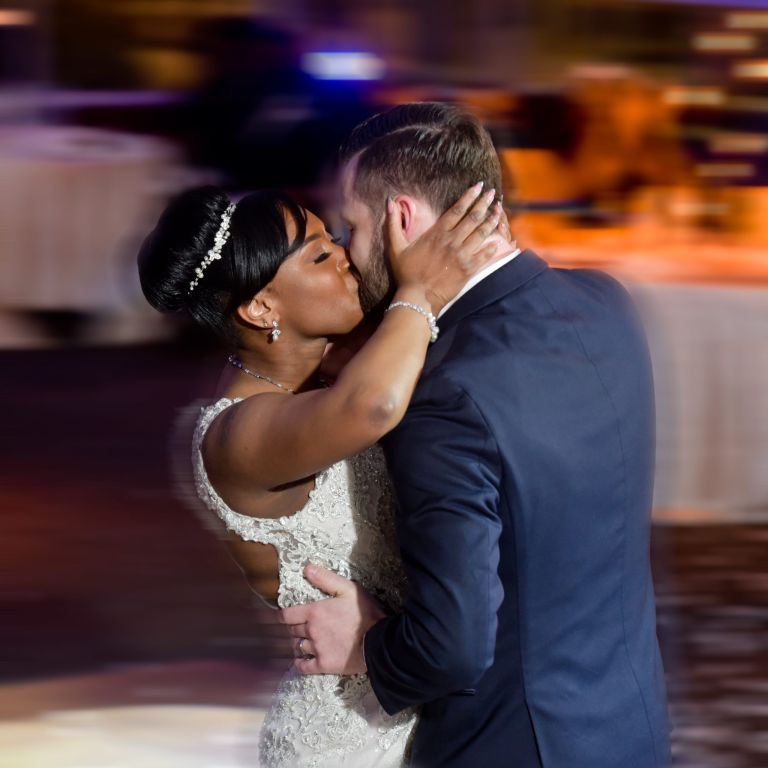 A smooch to end their first dance at Roostertail in Detroit, Michigan.