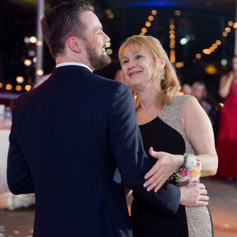 Mother and son dance at Roostertail in Detroit, Michigan.