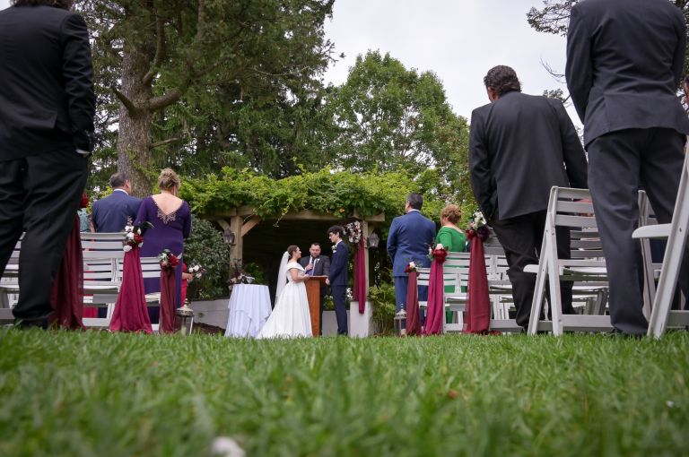 A sweet and emotional wedding ceremony at Addison Oaks Buhl Estates in Leonard, Michigan.