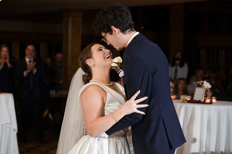 The bride and groom enjoying their first dance at their wedding at Addison Oaks Buhl Estates in Leonard, Michigan.