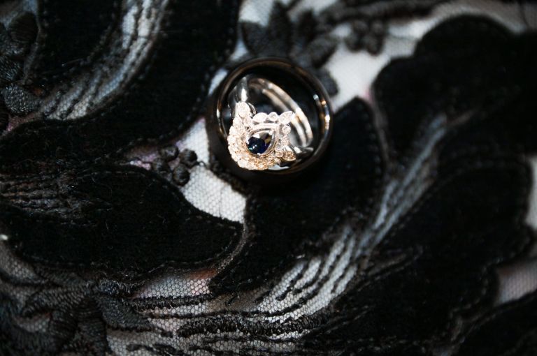 The bride's rings on her wedding train at the Canterbury Village for the Halloween themed wedding.