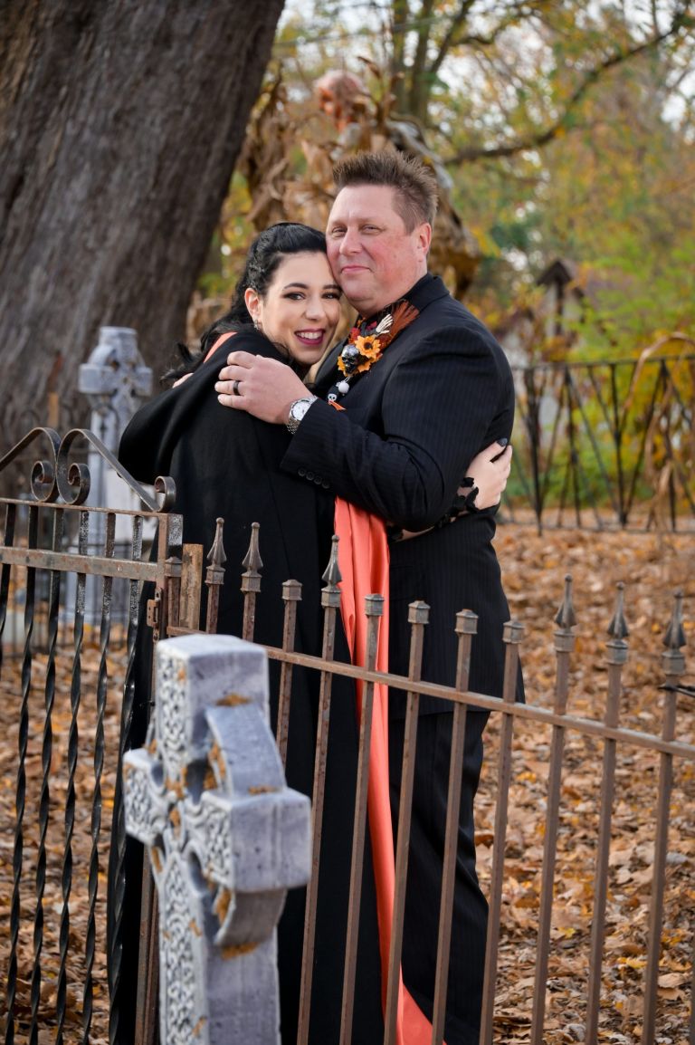 A visit to the graveyard for a romantic photo at the Canterbury Village for the Halloween themed wedding.