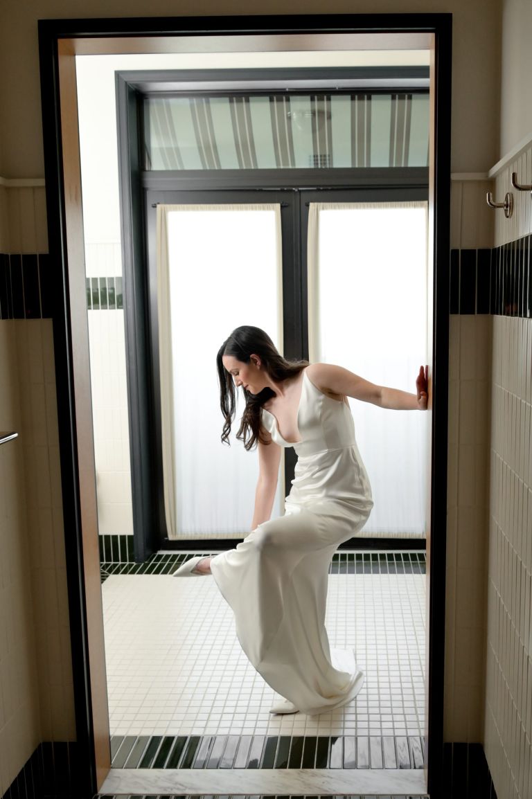 A bride gets ready at the Shinola Hotel downtown Detroit.