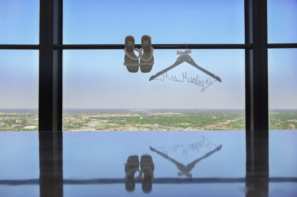 The bride's shoes and special hanger.