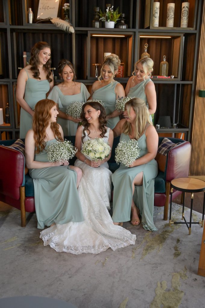 The bridesmaids back at the bar at the Highlands.