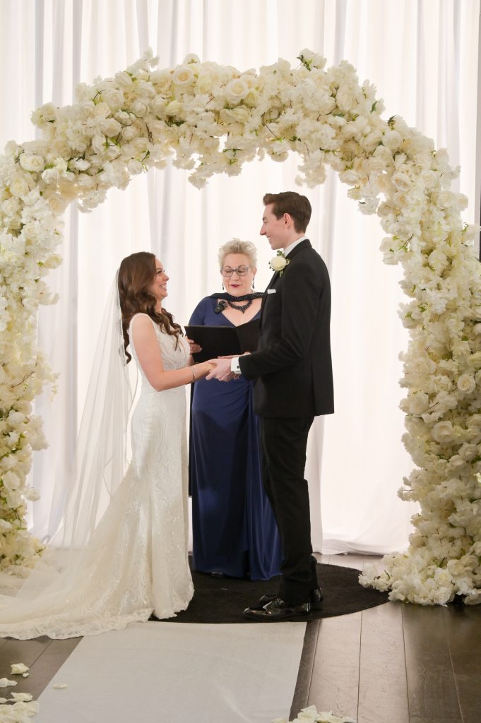 The groom's sister officiates the wedding at Highlands Detroit.