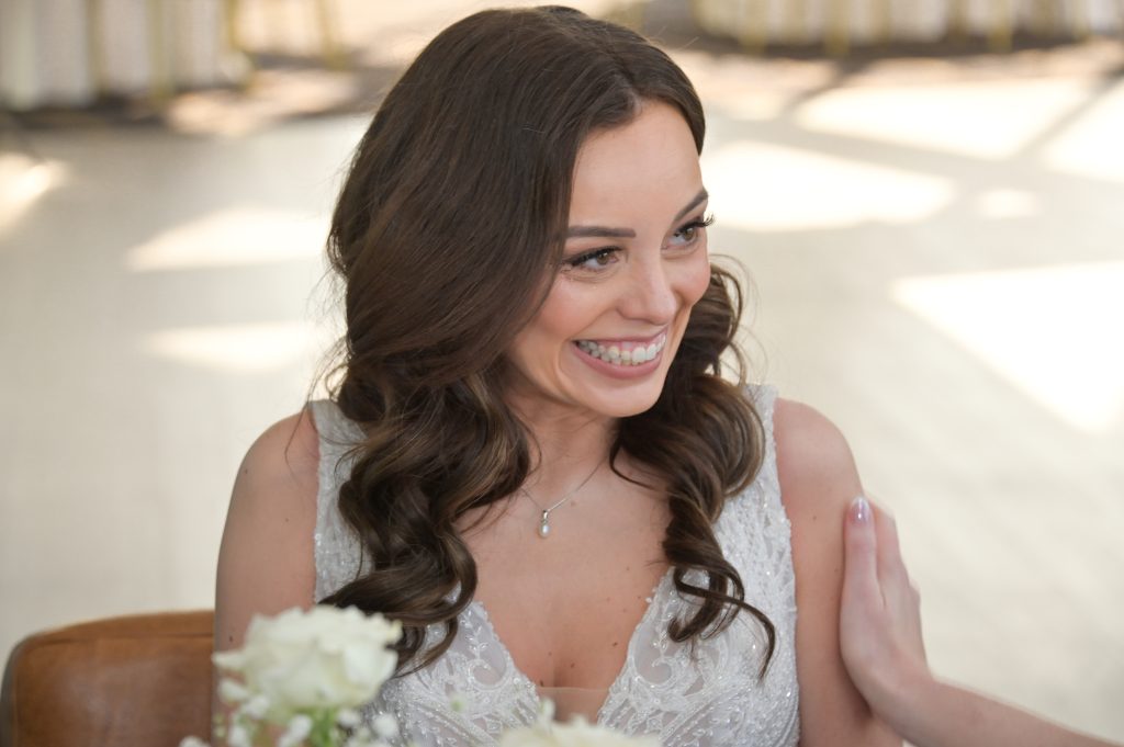 The bride after signing the marriage license.