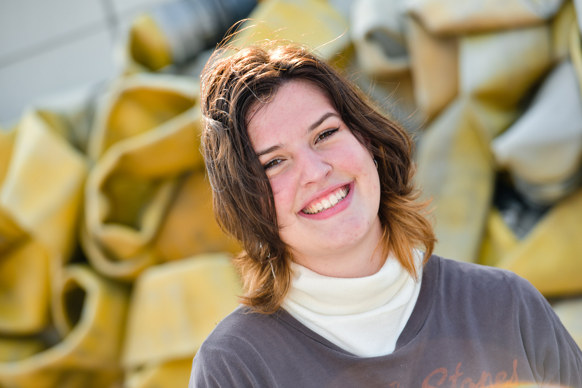 Carter with a squiggly pattern behind them for this contemporary senior photos in Detroit, Michigan.