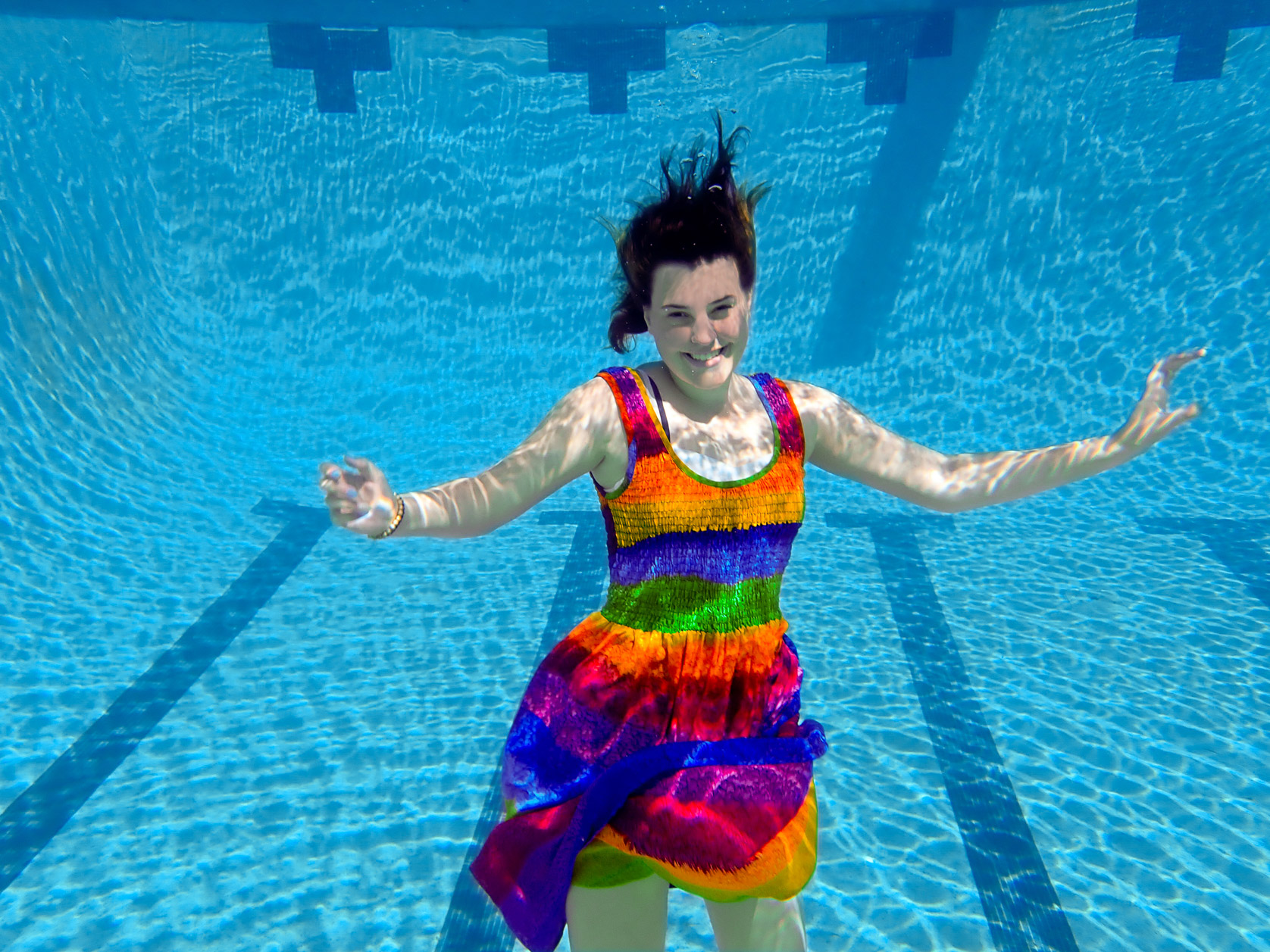 Bloomfield High swimmer, Carter underwater at the end of their senior session at The Wyndgate Country Club in Rochester Hills, Michigan. 