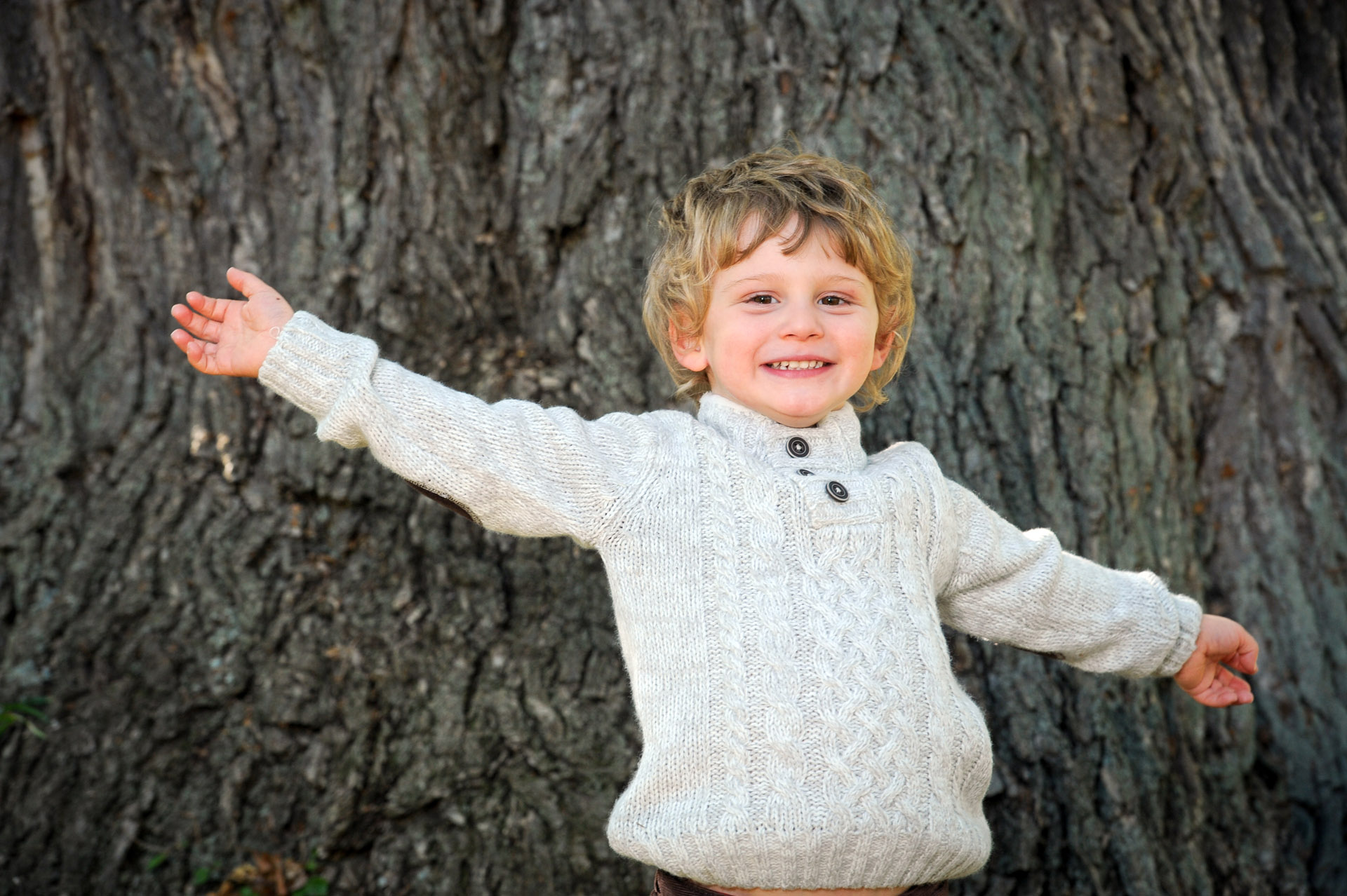 Best Detroit children photographer's children's photo of a metro Detroit boy showing off his personality at one of the Metro Detroit, Michigan parks I like to use for my children's photography sessions.