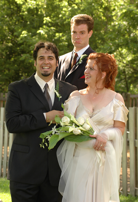 Michigan wedding photojournalist takes wedding photographs during the reception 