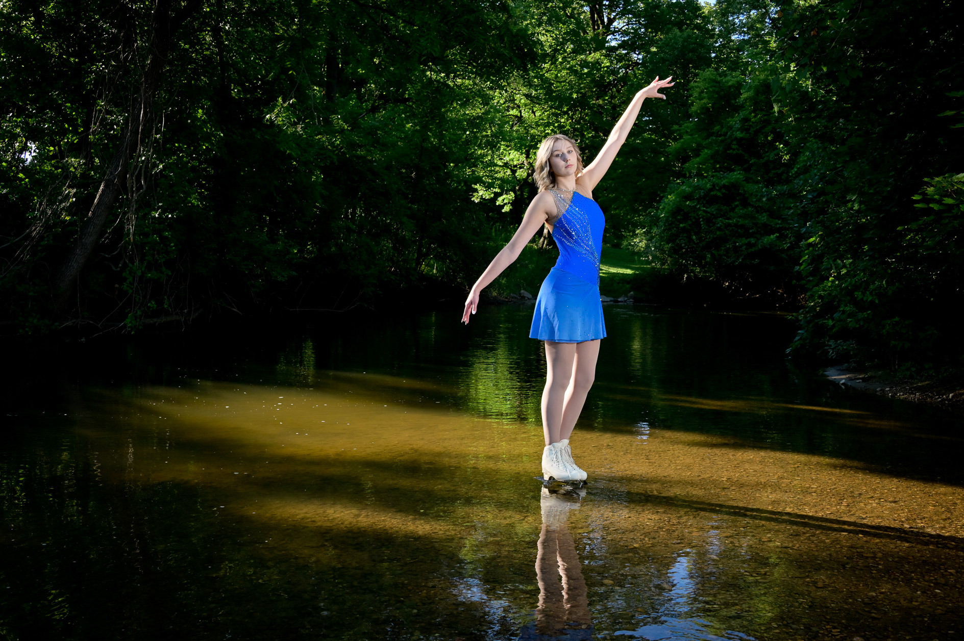 Troy ice skater Victoria on water in her ice skates near Troy, Mich.