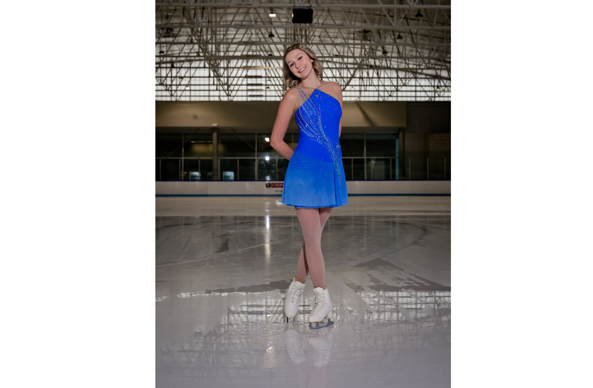A similar traditional ice skater's pose but from a different angle at an ice rink near Rochester, Michigan.