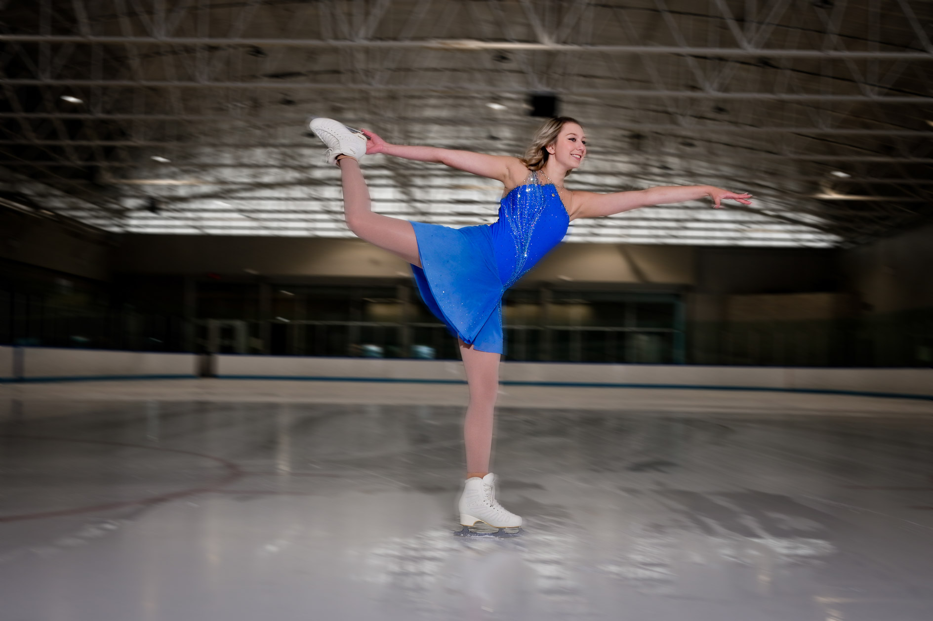 Victoria makes a pass on the ice for this classic senior figure skating photo.
