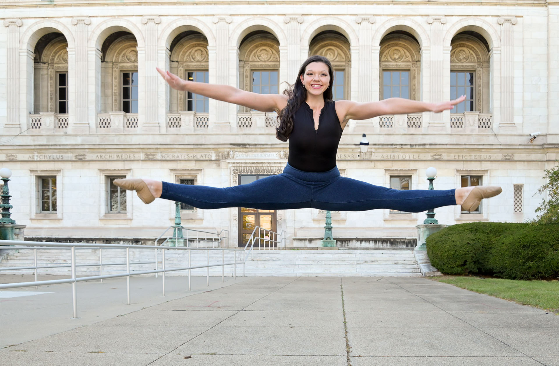 Olivia with a final leap and perfect splits for a dramatic finish for her senior picture photography session.
